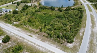 Stunning Waterfront Lot in Indian Lake Estates - Build Your on Indian Lake Estates Golf and Country Club in Florida - for sale on GolfHomes.com, golf home, golf lot