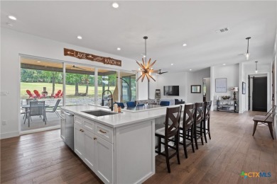 Stunning, modern-contemporary Point Venture home nestled just on Point Venture Golf Club on Lake Travis in Texas - for sale on GolfHomes.com, golf home, golf lot