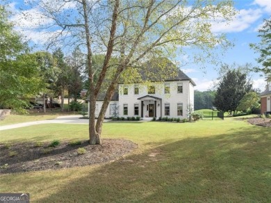 Absolutely stunning two-story home situated on the 6th fairway on Royal Lakes Golf and Country Club in Georgia - for sale on GolfHomes.com, golf home, golf lot