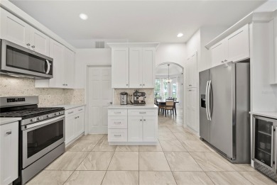 Welcome to your dream oasis! This stunning 4-bedroom, 3-bath on The Oasis Club at Champions Gate in Florida - for sale on GolfHomes.com, golf home, golf lot