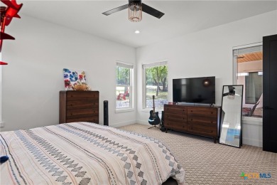 Stunning, modern-contemporary Point Venture home nestled just on Point Venture Golf Club on Lake Travis in Texas - for sale on GolfHomes.com, golf home, golf lot