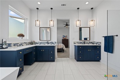 Stunning, modern-contemporary Point Venture home nestled just on Point Venture Golf Club on Lake Travis in Texas - for sale on GolfHomes.com, golf home, golf lot