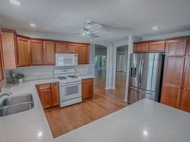 This beautifully refreshed, warm and inviting Cypress model in on Glenview Championship Golf and Country Club in Florida - for sale on GolfHomes.com, golf home, golf lot