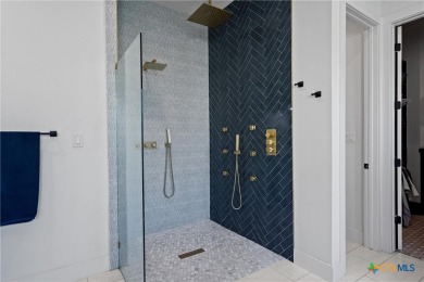 Stunning, modern-contemporary Point Venture home nestled just on Point Venture Golf Club on Lake Travis in Texas - for sale on GolfHomes.com, golf home, golf lot