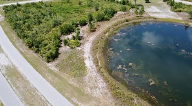 Stunning Waterfront Lot in Indian Lake Estates - Build Your on Indian Lake Estates Golf and Country Club in Florida - for sale on GolfHomes.com, golf home, golf lot