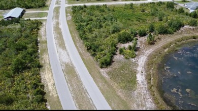 Stunning Waterfront Lot in Indian Lake Estates - Build Your on Indian Lake Estates Golf and Country Club in Florida - for sale on GolfHomes.com, golf home, golf lot
