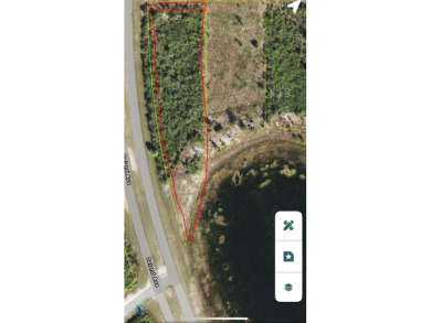 Stunning Waterfront Lot in Indian Lake Estates - Build Your on Indian Lake Estates Golf and Country Club in Florida - for sale on GolfHomes.com, golf home, golf lot