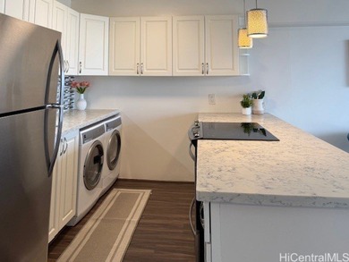 Updated, move-in-ready, 2 bedrooms / 2 bathrooms / 2 covered on Ala Wai Golf Course in Hawaii - for sale on GolfHomes.com, golf home, golf lot