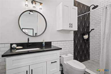 Stunning, modern-contemporary Point Venture home nestled just on Point Venture Golf Club on Lake Travis in Texas - for sale on GolfHomes.com, golf home, golf lot