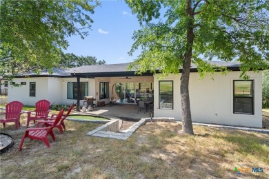 Stunning, modern-contemporary Point Venture home nestled just on Point Venture Golf Club on Lake Travis in Texas - for sale on GolfHomes.com, golf home, golf lot