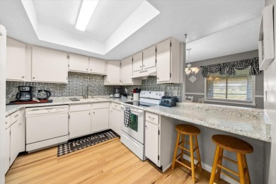 Spectacular UPDATED Lakefront 55+ Condo!  Fabulous views of Lake on Country Club At Silver Springs Shores in Florida - for sale on GolfHomes.com, golf home, golf lot