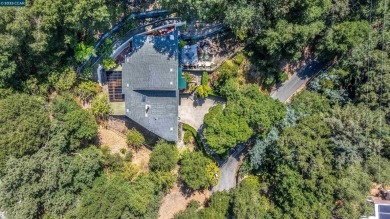 Stunning contemporary 4-bedroom, 3-bathroom home in the coveted on Orinda Country Club in California - for sale on GolfHomes.com, golf home, golf lot