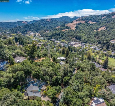 Stunning contemporary 4-bedroom, 3-bathroom home in the coveted on Orinda Country Club in California - for sale on GolfHomes.com, golf home, golf lot