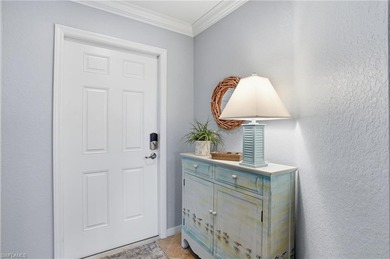 Turnkey Updated 2+Den End Unit with Golf & Lake Views | TPC on TPC At Treviso Bay in Florida - for sale on GolfHomes.com, golf home, golf lot