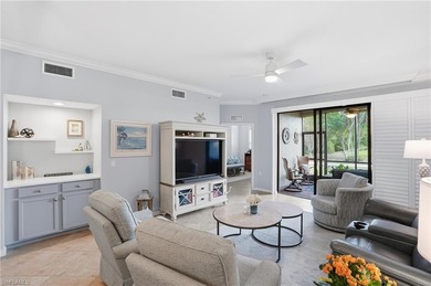 Turnkey Updated 2+Den End Unit with Golf & Lake Views | TPC on TPC At Treviso Bay in Florida - for sale on GolfHomes.com, golf home, golf lot