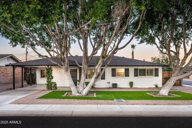 This exceptional corner-lot residence boasts a charming carport on Coronado Golf Course in Arizona - for sale on GolfHomes.com, golf home, golf lot