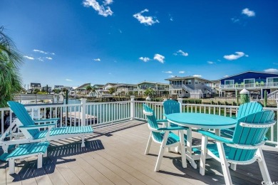 Wow! 4-Bedroom, waterfront, channel home close to the Beach in on Beachwood Golf Club in South Carolina - for sale on GolfHomes.com, golf home, golf lot