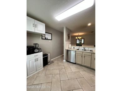 Here is your opportunity to own an end unit one-level townhome on Golf Club At Fleming Island in Florida - for sale on GolfHomes.com, golf home, golf lot