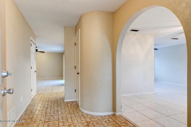 Opportunity knocking. Easy care tiled front entrance foyer (11'x on Daytona Beach Golf Club in Florida - for sale on GolfHomes.com, golf home, golf lot