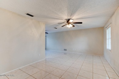 Opportunity knocking. Easy care tiled front entrance foyer (11'x on Daytona Beach Golf Club in Florida - for sale on GolfHomes.com, golf home, golf lot