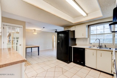 Opportunity knocking. Easy care tiled front entrance foyer (11'x on Daytona Beach Golf Club in Florida - for sale on GolfHomes.com, golf home, golf lot