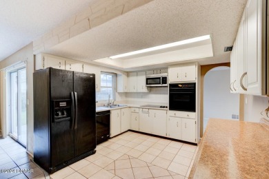 Opportunity knocking. Easy care tiled front entrance foyer (11'x on Daytona Beach Golf Club in Florida - for sale on GolfHomes.com, golf home, golf lot