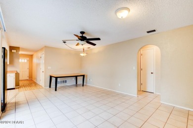 Opportunity knocking. Easy care tiled front entrance foyer (11'x on Daytona Beach Golf Club in Florida - for sale on GolfHomes.com, golf home, golf lot