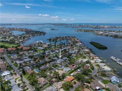 Welcome home, to this completely renovated coastal modern on Pasadena Yacht and Country Club in Florida - for sale on GolfHomes.com, golf home, golf lot