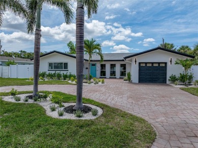 Welcome home, to this completely renovated coastal modern on Pasadena Yacht and Country Club in Florida - for sale on GolfHomes.com, golf home, golf lot