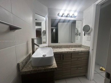 BEAUTIFUL 1 BEDROOM 1.5 BATHROOM SCREENED BALCONY WITH A on Presidential Estate Golf Course in Florida - for sale on GolfHomes.com, golf home, golf lot