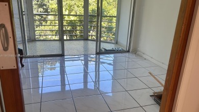 BEAUTIFUL 1 BEDROOM 1.5 BATHROOM SCREENED BALCONY WITH A on Presidential Estate Golf Course in Florida - for sale on GolfHomes.com, golf home, golf lot