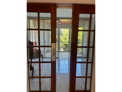 BEAUTIFUL 1 BEDROOM 1.5 BATHROOM SCREENED BALCONY WITH A on Presidential Estate Golf Course in Florida - for sale on GolfHomes.com, golf home, golf lot