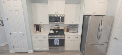 Experience refined 55+ living in this beautifully upgraded on On Top of the World Golf Course in Florida - for sale on GolfHomes.com, golf home, golf lot