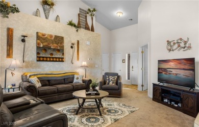 This immaculate, fully furnished townhome sits above the 15th on Wolf Creek At Paradise Canyon in Nevada - for sale on GolfHomes.com, golf home, golf lot