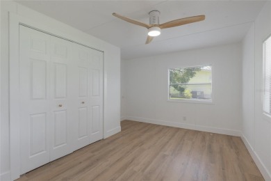 This adorable fully renovated manufactured home is the perfect on Silver Lake Executive Golf Course in Florida - for sale on GolfHomes.com, golf home, golf lot