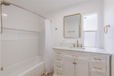 This adorable fully renovated manufactured home is the perfect on Silver Lake Executive Golf Course in Florida - for sale on GolfHomes.com, golf home, golf lot