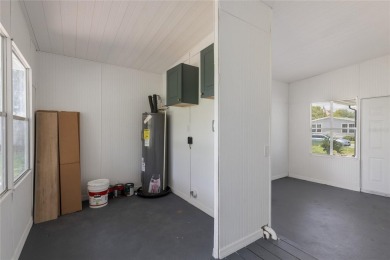 This adorable fully renovated manufactured home is the perfect on Silver Lake Executive Golf Course in Florida - for sale on GolfHomes.com, golf home, golf lot