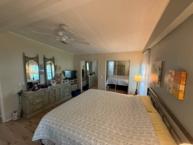 This well-cared for 2-bedroom, 2-bathroom home is being sold on Del Tura Golf and Country Club in Florida - for sale on GolfHomes.com, golf home, golf lot