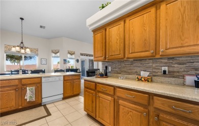 This immaculate, fully furnished townhome sits above the 15th on Wolf Creek At Paradise Canyon in Nevada - for sale on GolfHomes.com, golf home, golf lot