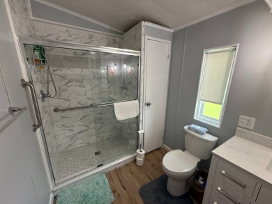 This well-cared for 2-bedroom, 2-bathroom home is being sold on Del Tura Golf and Country Club in Florida - for sale on GolfHomes.com, golf home, golf lot