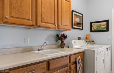 This immaculate, fully furnished townhome sits above the 15th on Wolf Creek At Paradise Canyon in Nevada - for sale on GolfHomes.com, golf home, golf lot