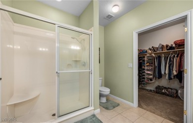 This immaculate, fully furnished townhome sits above the 15th on Wolf Creek At Paradise Canyon in Nevada - for sale on GolfHomes.com, golf home, golf lot