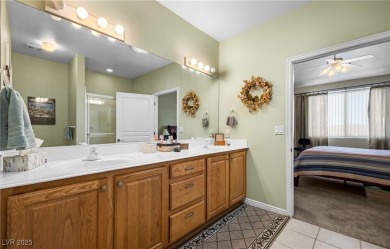 This immaculate, fully furnished townhome sits above the 15th on Wolf Creek At Paradise Canyon in Nevada - for sale on GolfHomes.com, golf home, golf lot