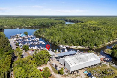 Ready for scenic views of the waterway and to enjoy waterfront on Wachesaw Plantation Club in South Carolina - for sale on GolfHomes.com, golf home, golf lot
