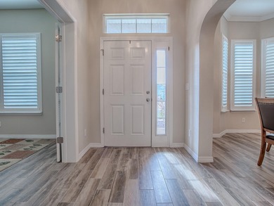 LOVELY Over Sized Frontier Model Home in STONECREST!  This is a on Stonecrest Golf and Club Club in Florida - for sale on GolfHomes.com, golf home, golf lot