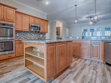 LOVELY Over Sized Frontier Model Home in STONECREST!  This is a on Stonecrest Golf and Club Club in Florida - for sale on GolfHomes.com, golf home, golf lot