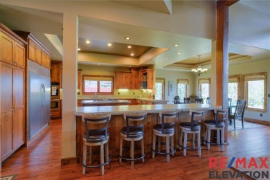 This custom-built timber-frame style home offers 4,514 sq. ft on Olive Glenn Golf and Country Club in Wyoming - for sale on GolfHomes.com, golf home, golf lot