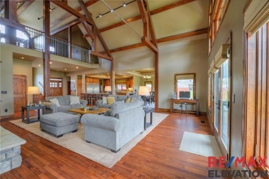 This custom-built timber-frame style home offers 4,514 sq. ft on Olive Glenn Golf and Country Club in Wyoming - for sale on GolfHomes.com, golf home, golf lot