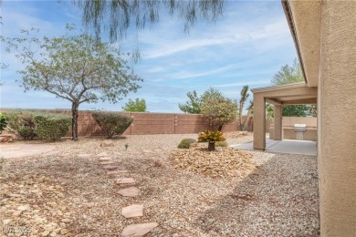Rare must-see home in the 55+ community of Sun City Aliante--the on Aliante Golf Club in Nevada - for sale on GolfHomes.com, golf home, golf lot