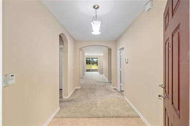 CHAMPIONSHIP GOLF COURSE VIEWS! Welcome to Leesburg's Premier on Arlington Ridge Golf Club in Florida - for sale on GolfHomes.com, golf home, golf lot